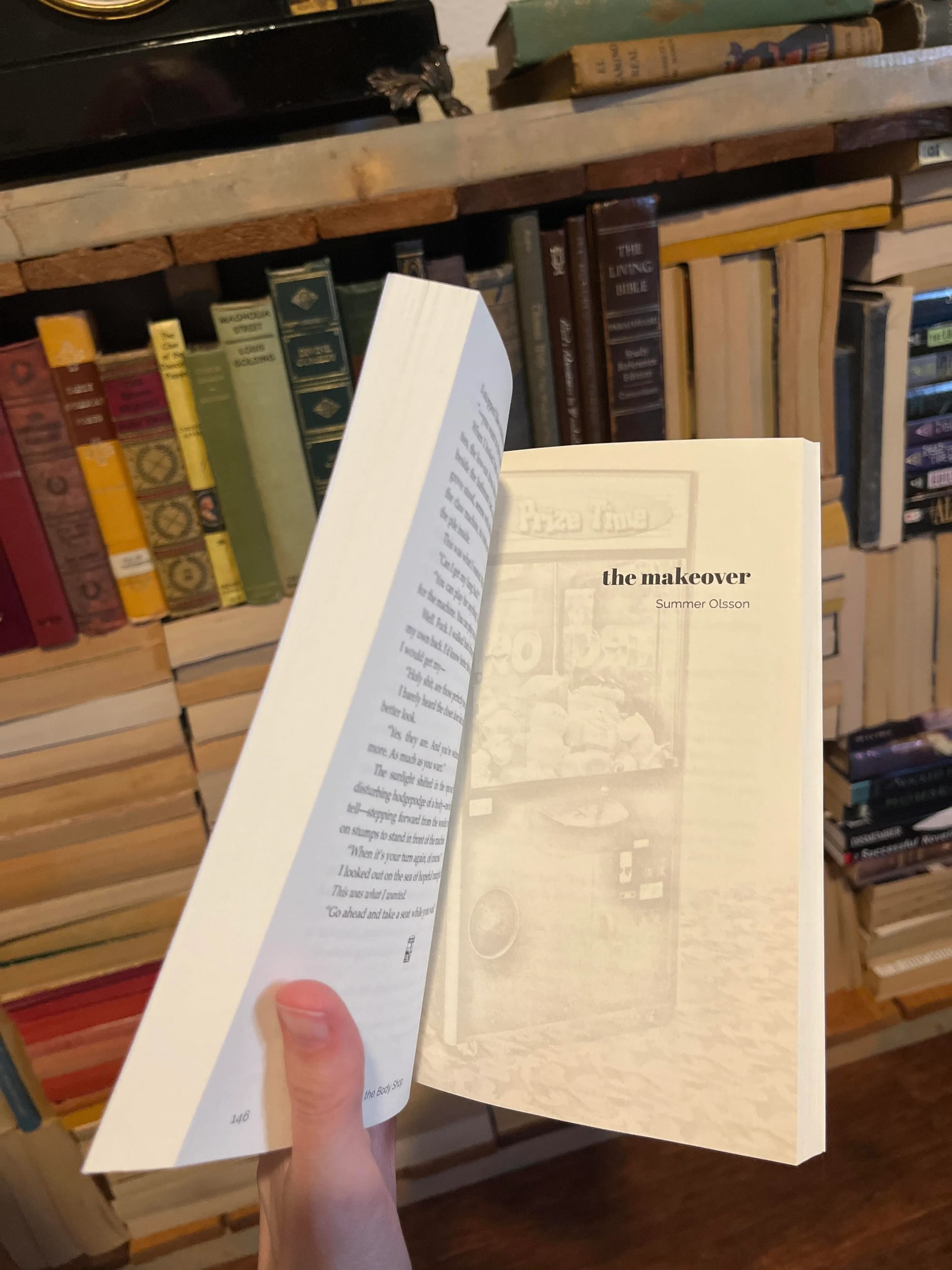 Open Claw Machine book to The Makeover by Summer Olsson, shows a header image with a faded photograph of a claw machine that says Prize Time